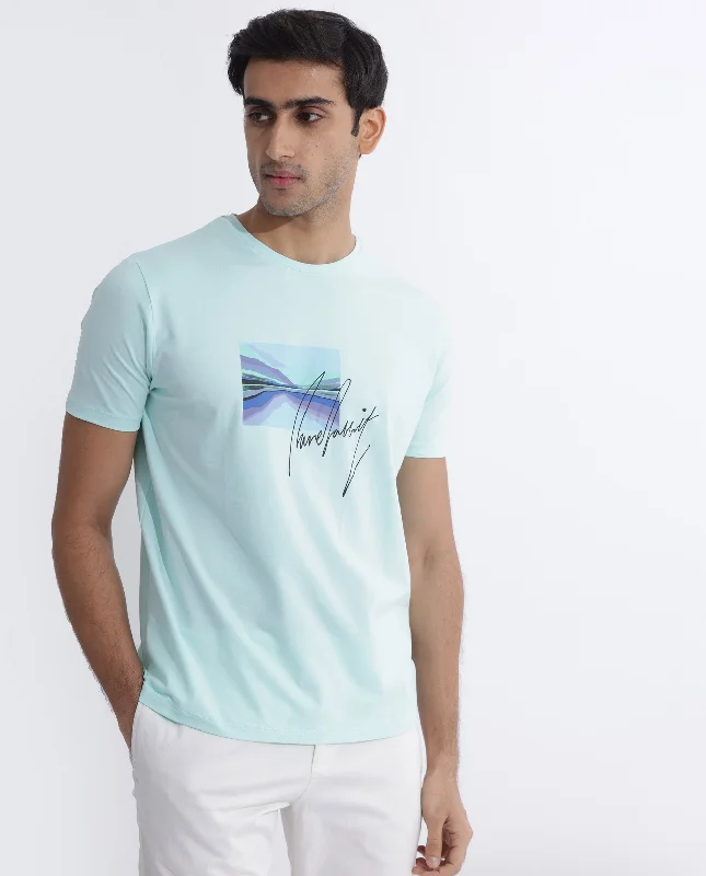 Men's Shirts with Ruffled HemlinesRare Rabbit Men's Libro Light Blue Crew Neck With Discharge Print Graphic And Signature Half Sleeves Slim Fit T-Shirt Men's Shirts with Ruffled HemlinesRare Rabbit Men's Libro Light Blue Crew Neck With Discharge Print Graphic And Signature Half Sleeves Slim Fit T-Shirt