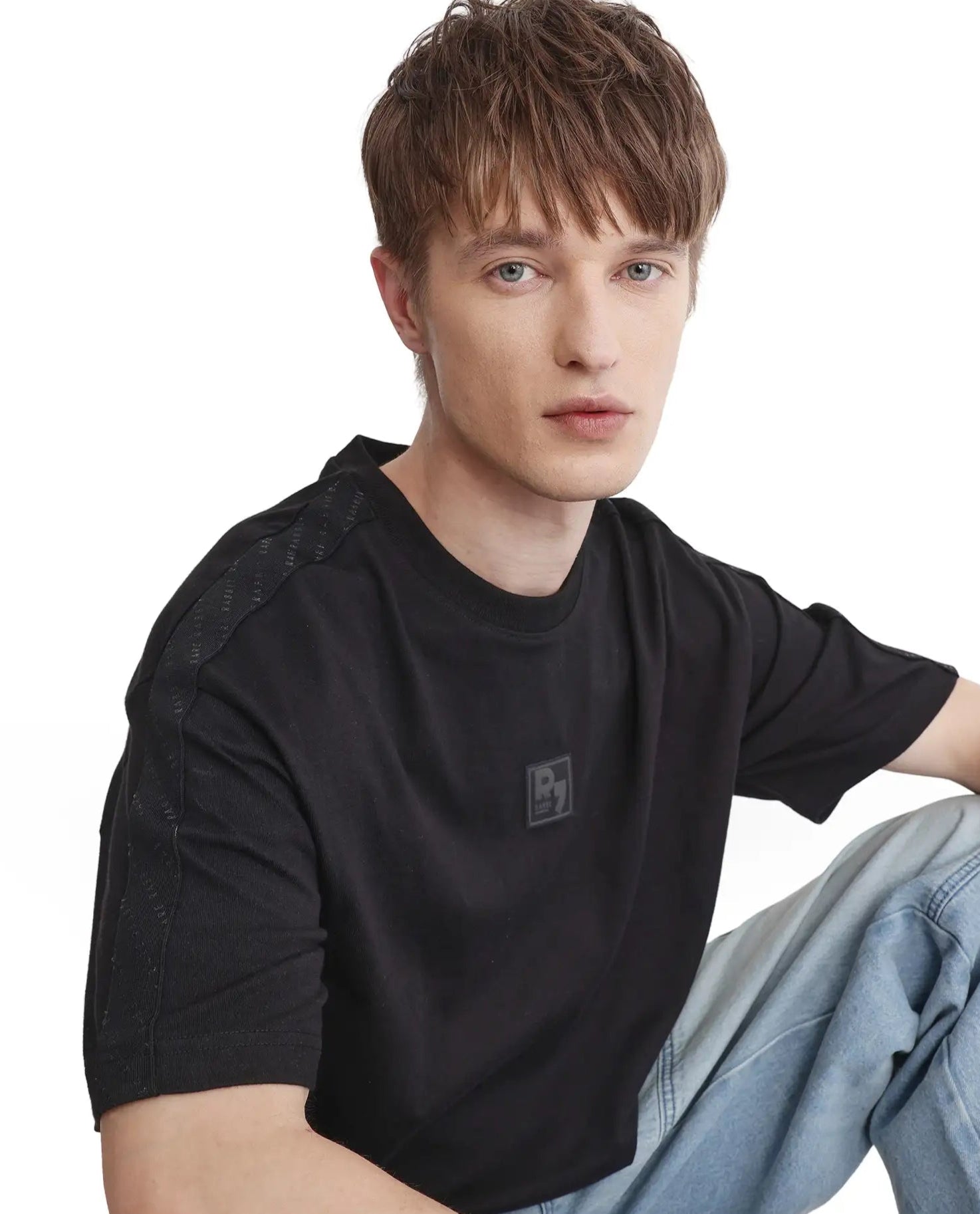 Men's Shirts with Single-Breasted DesignsRare Rabbit Men Quate Black Cotton Fabric Short Sleeve with Tape Details Badge Branding Boxy Fit Badge Branding T-Shirt Men's Shirts with Single-Breasted DesignsRare Rabbit Men Quate Black Cotton Fabric Short Sleeve with Tape Details Badge Branding Boxy Fit Badge Branding T-Shirt