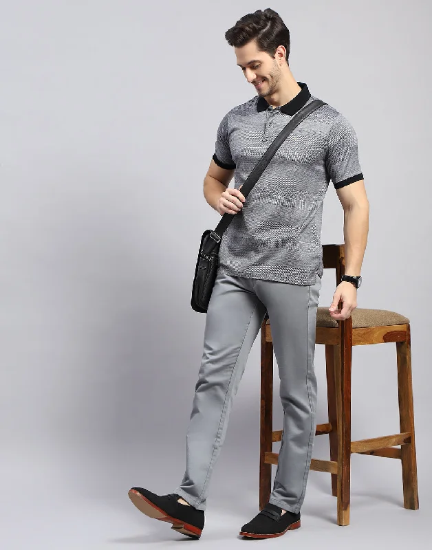 Men's Shirts with UV ProtectionMen Black Self Design Polo Collar Half Sleeve T-Shirt