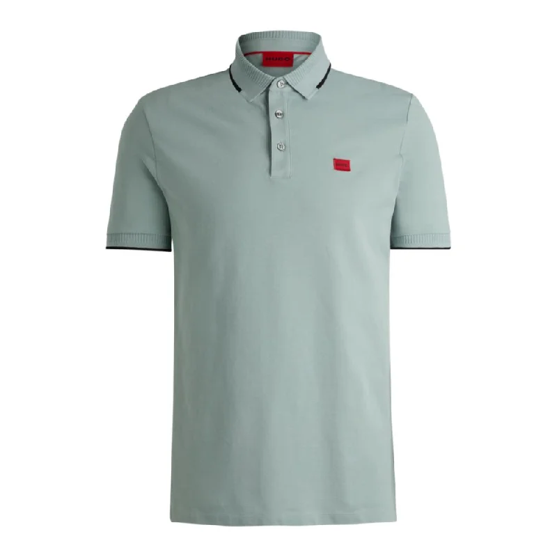 Men's Shirts with Raw-Edge HemlinesCotton-piqu slim-fit polo shirt with red logo label Men's Shirts with Raw-Edge HemlinesCotton-piqu slim-fit polo shirt with red logo label